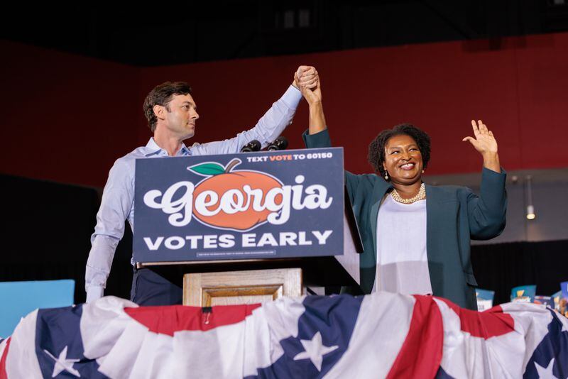 U.S. Sen. Jon Ossoff introduces gubernatorial candidate Stacey Abrams at a voting rally for Democrats in Atlanta on Oct. 28, 2022. Former President Barack Obama also attended the rally. (Arvin Temkar / arvin.temkar@ajc.com)