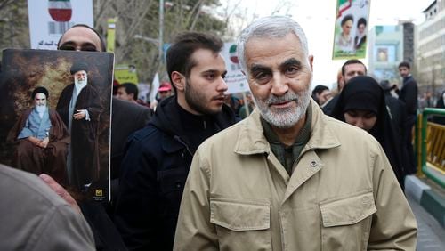 FILE - In this Thursday, Feb. 11, 2016, file photo, Qassem Soleimani, commander of Iran's Quds Force, attends an annual rally commemorating the anniversary of the 1979 Islamic revolution, in Tehran, Iran. The U.S. airstrike that killed a prominent Iranian general in Baghdad raises tensions even higher between Tehran and Washington after months of trading attacks and threats across the wider Middle East. (AP Photo/Ebrahim Noroozi, File)