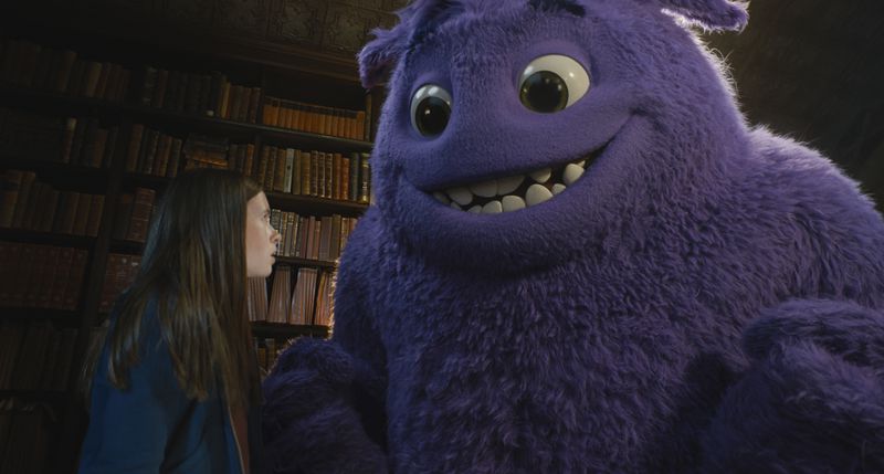 This image released by Paramount Pictures shows Cailey Fleming, left, with Blue, voiced by Steve Carell, in a scene from "IF." (Paramount Pictures via AP)