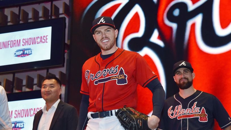 Atlanta Braves first baseman Freddie Freeman, wearing home Friday red uniform, poses during 2019 Uniform Showcase event at LIVE! at The Battery Atlanta as a part of Atlanta Braves 2019 Chop Fest events on Saturday, January 19, 2019. The Braves' annual Chop Fest fan event was hold Saturday at SunTrust Park and The Battery Atlanta. Activities include baseball clinics, autograph sessions, photo opportunities with players, interactive attractions, live entertainment and Q&A sessions. HYOSUB SHIN / HSHIN@AJC.COM