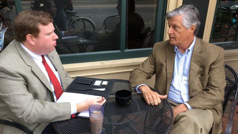 Savannah Mayor Eddie DeLoach, right, talks with his chief of staff Martin Sullivan. He’s a top Democratic target in the Dec. 3 runoff. AJC Photo/Greg Bluestein