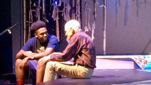 Brandel Butler (left) as Orlando, and Jim Wallace — who plays Orlando’s faithful servant — chat during rehearsals for the Kennesaw State University production of Shakespeare’s “As You Like It.” (Photo by Bill Torpy)