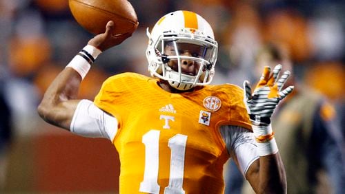 Tennessee quarterback Joshua Dobbs throws during warm ups before a game against Missouri in Knoxville in this Nov. 22, 2014, file photo. Photo by Associated Press /Times Free Press.
