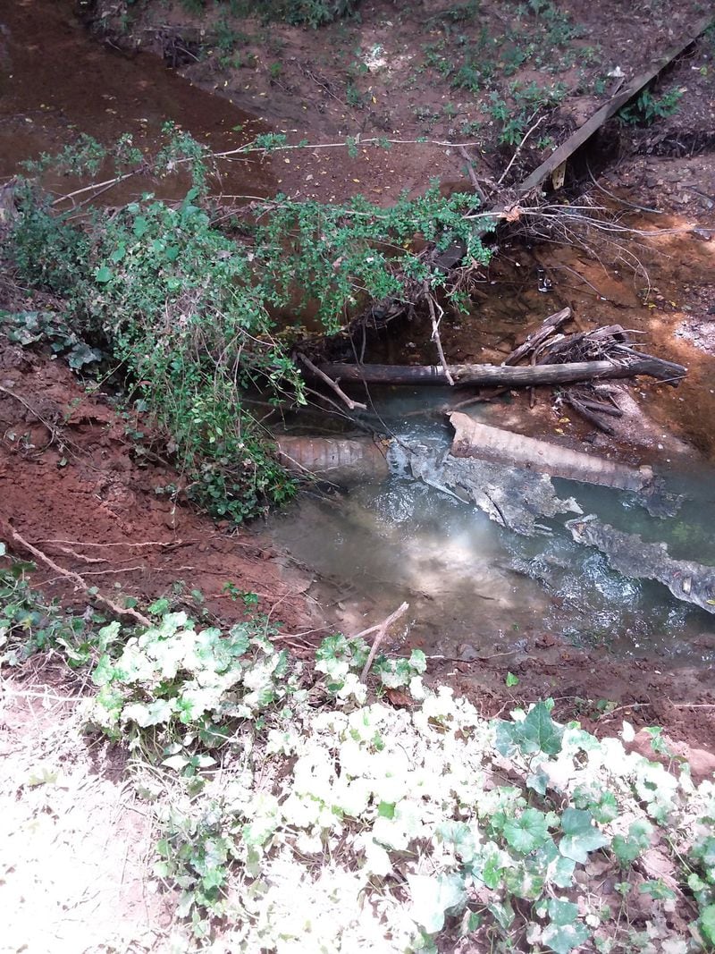A sewer line broke near a tributary to Nancy Creek in Brookhaven, spilling millions of gallons of sewage. It’s the largest spill in DeKalb County in more than a decade. Photo credit: DeKalb County