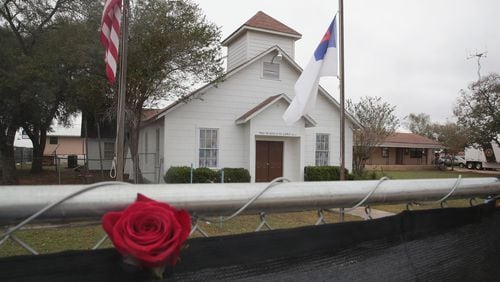FILE PHOTO:  A rose is left in the fence surrounding the First Baptist Church of Sutherland Springs on November 12, 2017 in Sutherland Springs, Texas. The congregation held service today in a tent on the towns ball park.  A gunman shot and killed the 26 people and wounded 20 others when he opened fire during Sunday service at the church.  (Photo by Scott Olson/Getty Images)