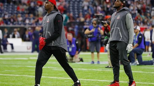 Julio Jones #11 of the Atlanta Falcons and Mohamed Sanu #12 warm up before Super Bowl 51 against the New England Patriots at NRG Stadium on February 5, 2017 in Houston, Texas.  (Photo by Kevin C. Cox/Getty Images)