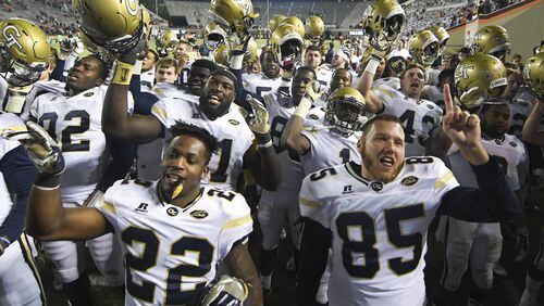 BLACKSBURG, VA - NOVEMBER 12: Members of the Georgia Tech Yellow Jackets sing the fight song following the victory against the Virginia Tech Hokies at Lane Stadium on November 12, 2016 in Blacksburg, Virginia. Georgia Tech defeated Virginia Tech 30-20. (Photo by Michael Shroyer/Getty Images)
