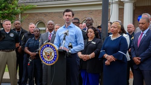 U.S. Sen. Jon Ossoff announces 25 of his Senate colleagues have signed on to his HELPER ACT during a Monday press conference at the north precinct of the Henry County Police Department in McDonough. (Jamie Spaar for the Atlanta Journal Constitution)