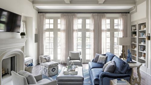 The living room in this young family’s new home in Brookhaven uses a soft neutral palette and pops of color that give it a fun yet elegant look. Kong designed the entire house from interior drawings to finishes and furnishings. Contributed by Mali Azima