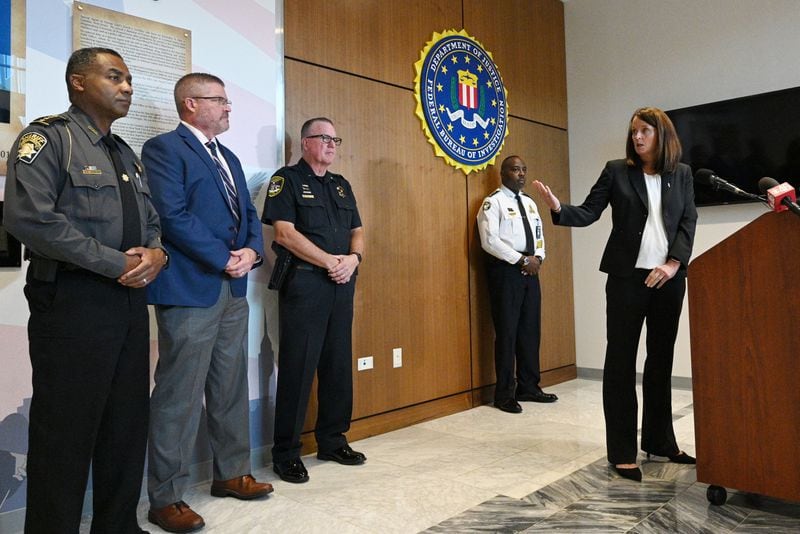 August 16, 2022 Chamblee - Keri Farley, Special Agent in Charge, speaks to members of the press as multi-full law enforcement officials stand behind her during a press conference to release local numbers in a multi-state child trafficking operation at Atlanta FBI Field Office in Chamblee on Tuesday, August 16, 2022. (Hyosub Shin / Hyosub.Shin@ajc.com)