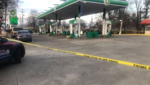 A man armed with a knife was shot by an off-duty state trooper Saturday afternoon outside a southeast Atlanta gas station, the GBI said.