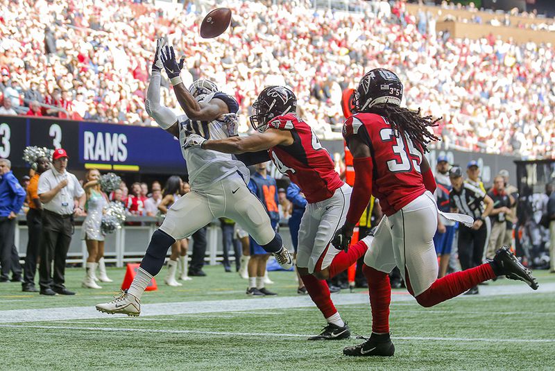 Rams running back Todd Gurley II (30) completes a catch for a touchdown during the first half Sunday, Oct. 20, 2019, against the Falcons at at Mercedes-Benz Stadium in Atlanta.