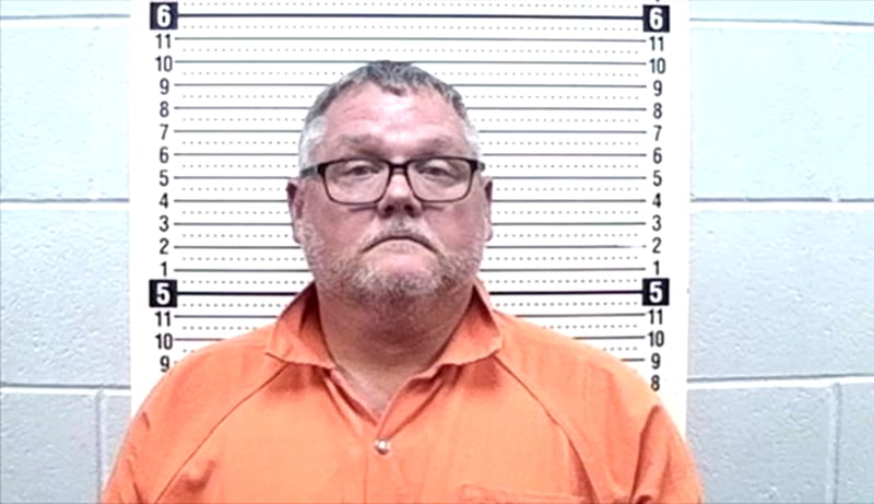 Brian Dennis Adams, former Smith State Prison warden, faces charges in a GBI corruption investigation into the prison.