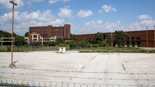 09/04/2020 -College Park, Georgia - The exterior of the former Sheraton Atlanta Airport  Hotel, located at 1900 Sullivan Road, in College Park, Friday, September 4, 2020. The hotel was acquired by the City of Atlanta for $16.8 million in 2017. Since the purchase, the hotel, which had a convention center attached, has been used for movie production. The city plans to demolish the hotel to make way for a runway expansion project. (Alyssa Pointer / Alyssa.Pointer@ajc.com)