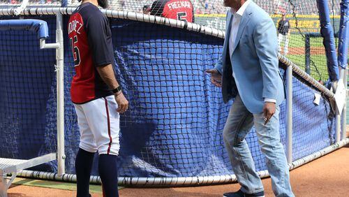 April 14, 2017, Atlanta: Chipper Jones gives pitcher Paco Rodriguez some pointers during batting practice at the Braves home opener in their new stadium at SunTrust Park on Friday, April 14, 2017, in Atlanta. Curtis Compton/ccompton@ajc.com