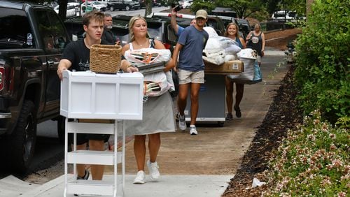 University of Georgia students move into campus housing in August. The school is planning to build a new residence hall for first-year students. (Hyosub Shin /AJC FILE PHOTO)