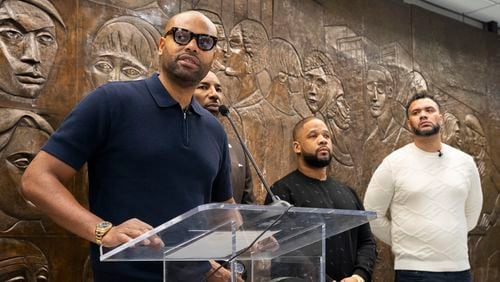 Rashad Bilal, along with Mayor Andre Dickens, Matthew Garland, and Michael MacDonald, announces the details for Atlanta's fourth annual Invest Fest, at Atlanta City Hall on Friday, March 22, 2024. (Olivia Bowdoin for the AJC).