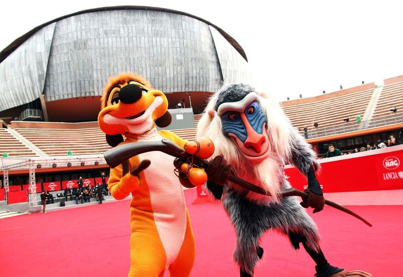 Characters Rafiki (R) and Timon as they attend "The Lion King 3D" Premiere during the 6th International Rome Film Festival on November 4, 2011 in Rome, Italy.