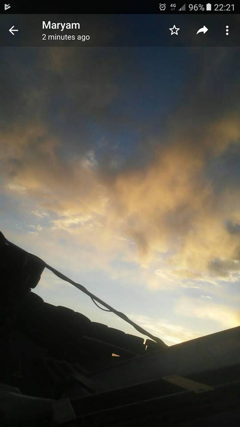 Von Chelet Leveille said this picture of the sky was among the photos his sister sent from a New Mexico compound. In this moment, the compound’s occupants said they’d seen a face in the sky.