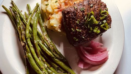Hanger Steak with green beans, smashed potatoes and pickled onions.
Bob Townsend for the Atlanta Journal-Constitution