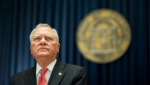 Georgia Gov. Nathan Deal speaks before signing an executive order requiring state agencies to start preparations now for the enactment of the state's medical marijuana bill Friday, March 27, 2015, in Atlanta. The bill becomes law when he signs it soon after the current legislative session ends April 2. The bill, sponsored by Peake, will allow the use of cannabis oil for treatment of certain medial conditions. (AP Photo/David Goldman)