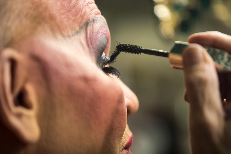 Charles Dillard applies mascara in his dressing room before the start of a show at Lips in Atlanta on a recent Friday night. Dillard has been a staple of Atlanta’s drag scene, with shows like Charlie Brown’s Cabaret at Backstreet and gigs at Blake’s on the Park.