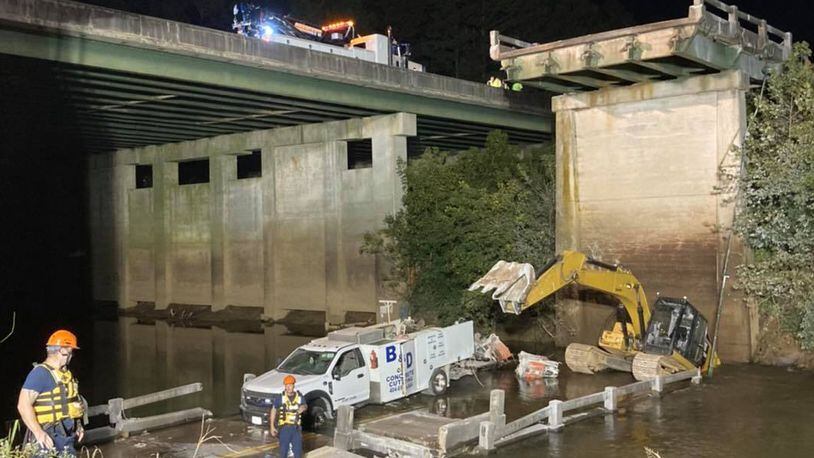 A man was killed and two others were seriously injured when a portion of a bridge collapsed Tuesday in Newton County.