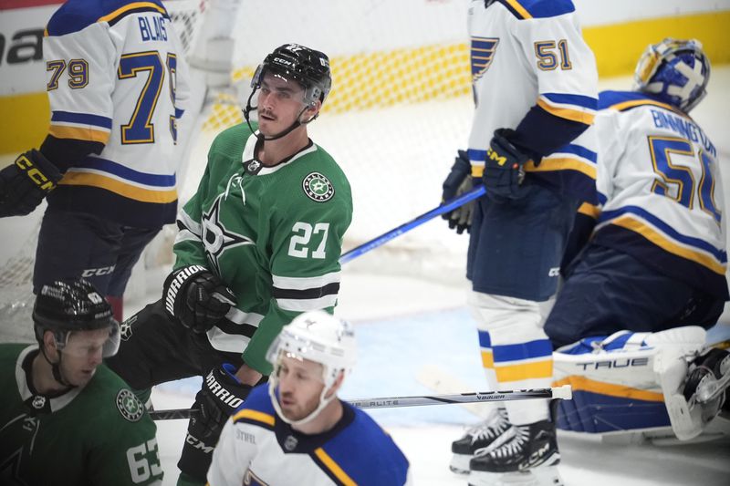 Dallas Stars left wing Mason Marchment (27) celebrates after scoring against the St. Louis Blues during the third period of an NHL hockey game in Dallas, Wednesday, April 17, 2024. (AP Photo/Tony Gutierrez)