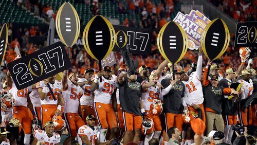 Clemson players celebrate after winning the College Football Playoff championship game against Alabama Tuesday, Jan. 10, 2017, in Tampa, Fla. Clemson won 35-31.