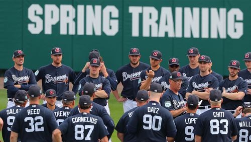 Braves manager Brian Snitker gathers his players on the field for the first full squad workout at spring training in Champion Stadium on Saturday Feb. 18, 2017, at the ESPN Wide World of Sports in Lake Buena Vista., Fla.