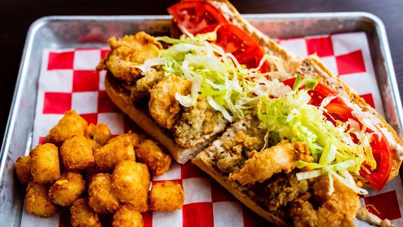 The “Shoyster” po’boy at Lagarde American Eatery gives you a mix of fried oysters and fried shrimp. CONTRIBUTED BY HENRI HOLLIS