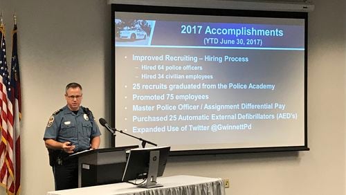 Gwinnett County police Chief Butch Ayers outlines his department’s recent achievements during his 2018 budget proposal in front of Commission Chairman Charlotte Nash on Wednesday. TYLER ESTEP / TYLER.ESTEP@AJC.COM