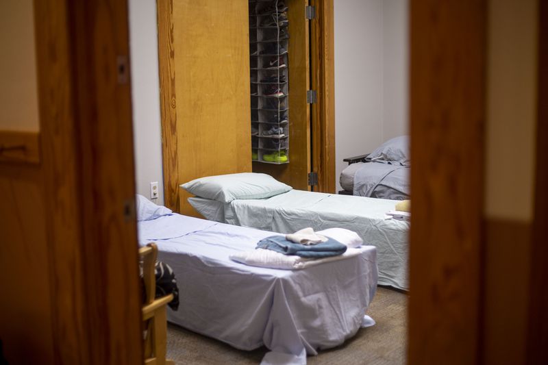 Fresh sheets and bathroom towels are laid out for immigrants and asylum seekers that need to spend the night at the Casa Alterna hospitality residence in Decatur, Friday, Aug. 20, 2021. (Alyssa Pointer/Atlanta Journal Constitution)