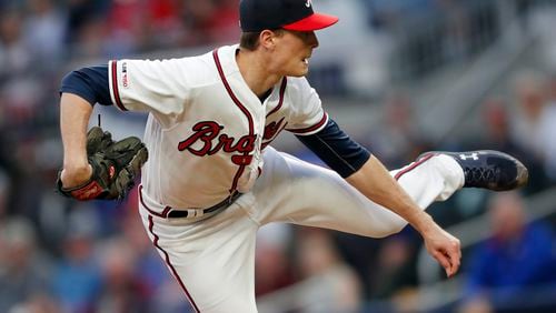 Atlanta Braves starting pitcher Max Fried (54) works against the Chicago Cubs in the first inning of baseball game Thursday, April 4, 2019, in Atlanta.