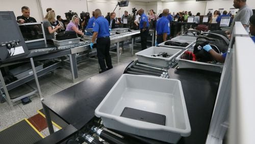 A TSA checkpoint at Hartsfield-Jackson during the rollout of smart lanes in 2016.  BOB ANDRES  / BANDRES@AJC.COM