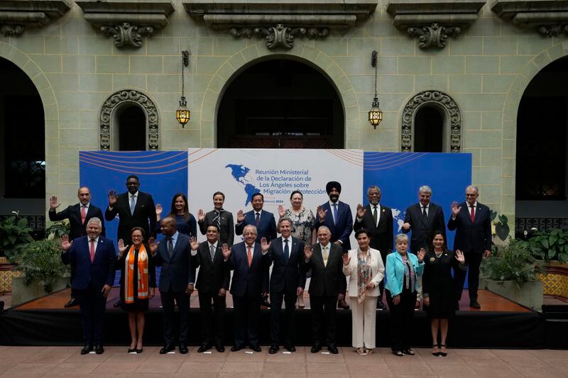 Guatemalan Foreign Minister Carlos Ramiro Martinez Alvarado, front row, fifth from left, and U.S. Secretary of State Antony Blinken, front row, sixth from left, pose for a group photo with other regional representatives at the National Palace in Guatemala City, Tuesday, May 7, 2024. Blinken is in Guatemala for a two-day visit where he will attend a regional meeting on irregular migration. (AP Photo/Moises Castillo)
