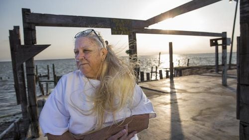 Mary Ann Heiman purchased windstorm insurance for her property along the causeway between Aransas Pass and Port Aransas, believing her business was covered when Hurricane Harvey destroyed the property. However, later, when she placed a claim with the Texas Windstorm Insurance Association (TWIA), she was denied citing an inverted address number. Heiman stands on the concrete platform where the business once stood, on Thursday April 20, 2018, in Port Aransas, TX.