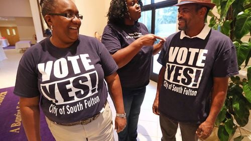 Damita Chatman (from left), Mandisha Thomas, and Kwame Wise sport shirts supporting cityhood as they arrive for a forum on what’s at stake if residents vote to form the City of South Fulton at Enon Baptist Church on Tuesday, Oct. 18, 2016, in College Park. All three are running for city council. Curtis Compton /ccompton@ajc.com AJC File Photo