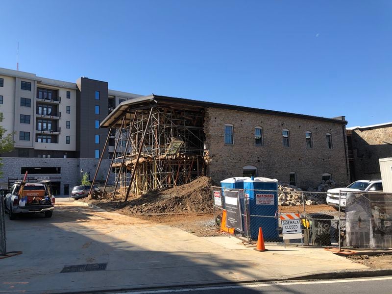 Crews work this week on restoring the former Masquerade along Atlanta's North Avenue, which partially collapsed in a construction mishap in December.