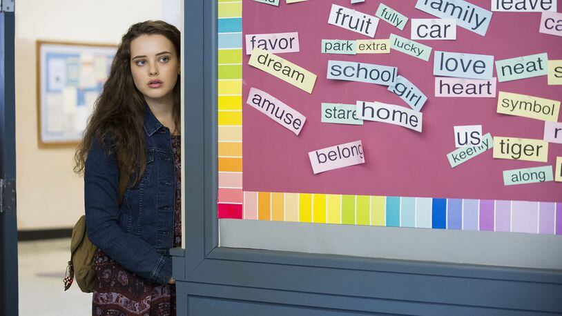 The Netflix show “13 Reasons Why,” starring Katherine Langford as a teenager who commits suicide and leaves behind tapes telling why, has been controversial. Because of the concern expressed by many mental health experts that the show is inaccurate and potentially dangerous, especially to vulnerable students, Netflix has added a warning to the start of each episode. On the other hand, the show has encouraged discussions about suicide. CONTRIBUTED BY BETH DUBBER / NETFLIX