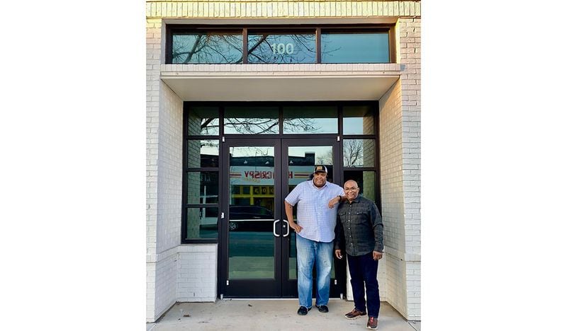 Duane Nutter (left) and partner Reggie Washington are seen in front of their forthcoming Summerhill restaurant, Southern National. Courtesy of Southern National