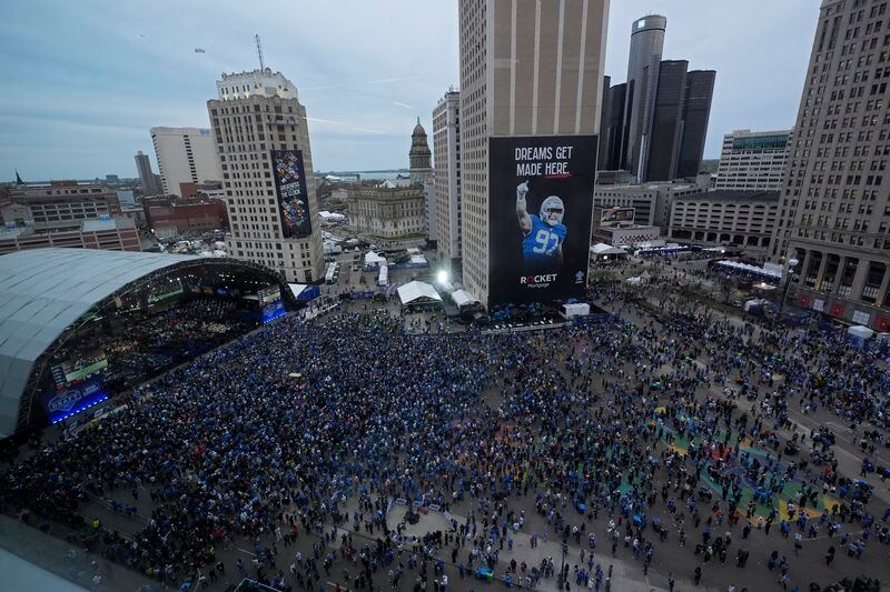 Crowds watch during the second round of the NFL football draft, Friday, April 26, 2024, in Detroit. (AP Photo/Paul Sancya)