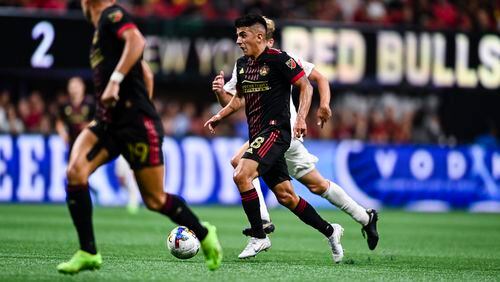 Atlanta United's Thiago Almada dribbles the ball during the match against New York Red Bulls on Wednesday night at Mercedes-Benz Stadium. (Photo by Mitchell Martin/Atlanta United)