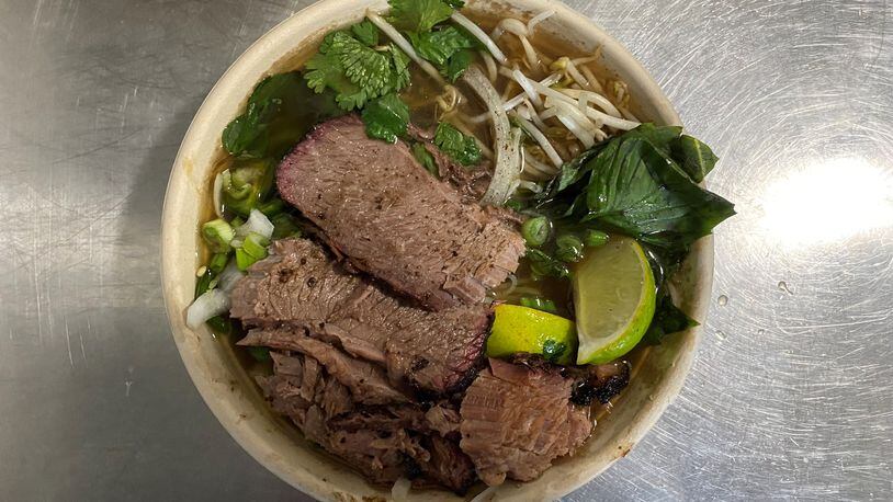 Pho Cue makes a very good version of its namesake dish, this one with smokey beef brisket. Wendell Brock for The Atlanta Journal-Constitution