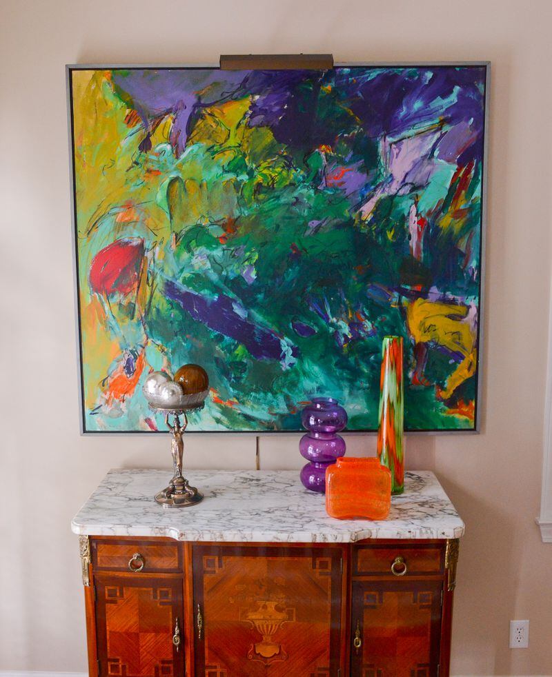 A favorite piece is a 1920s French buffet with beautiful inlaid detailing and thick marble top. It's in the entryway, juxtaposed with an abstract contemporary painting. Text by Lori Johnston and Keith Still/Fast Copy News Service. (Christopher Oquendo Photography/www.ophotography.com)