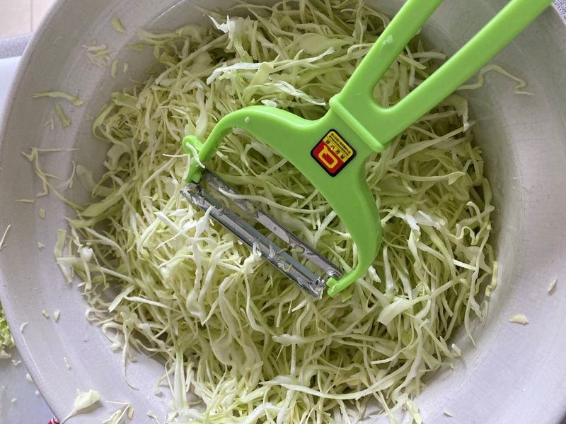 This Korean-made vegetable peeler, available at Buford Highway Farmers Market for $4, is extremely handy when it comes to slicing cabbage for okonomiyaki. The trick is to cut the cabbage thin. 
Wendell Brock/For The AJC
