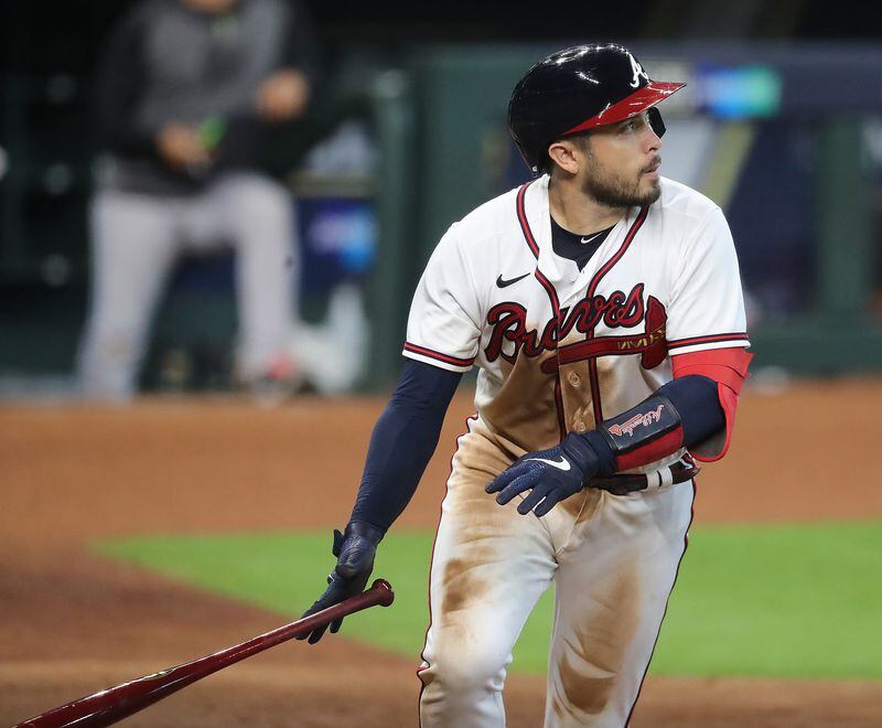 Braves' Travis D’Arnaud hits a three run homer to take a 7-4 lead over the Miami Marlins during the 7th inning in Game 1 of a National League Division Series at Minute Maid Park on Tuesday, Oct 6, 2020 in Houston.   “Curtis Compton / Curtis.Compton@ajc.com”