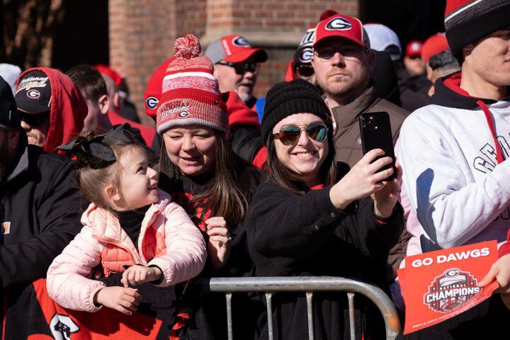 Fans take  a selfie along the Dog Walk before the UGA football celebration Saturday, Jan. 14, 2023 in Athens. Ben Gray for the Atlanta Journal-Constitution