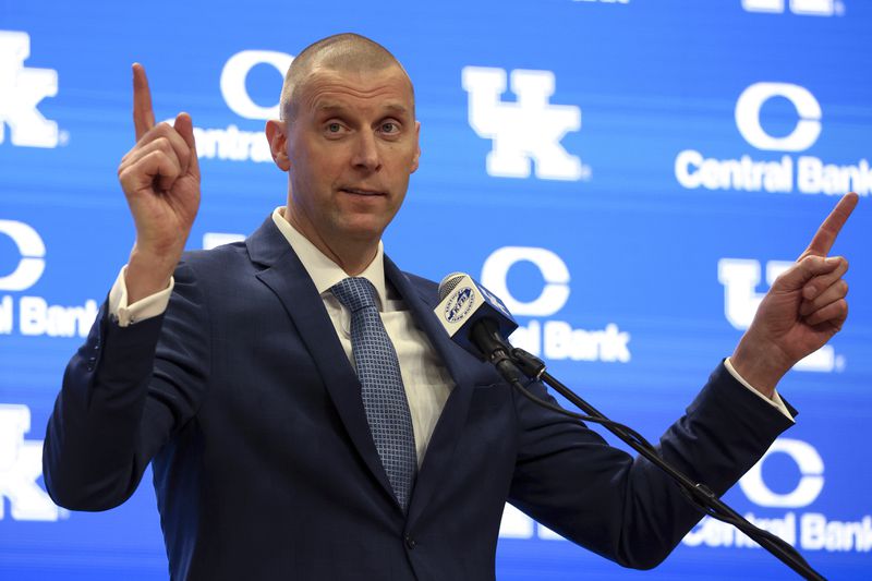 FILE - Mark Pope speaks to fans and media after being named Kentucky men's NCAA college basketball head coach in Lexington, Ky., Sunday, April 14, 2024. Pope has significantly reshaped the Wildcats’ roster with transfers after taking over for John Calipari. (AP Photo/James Crisp, File)