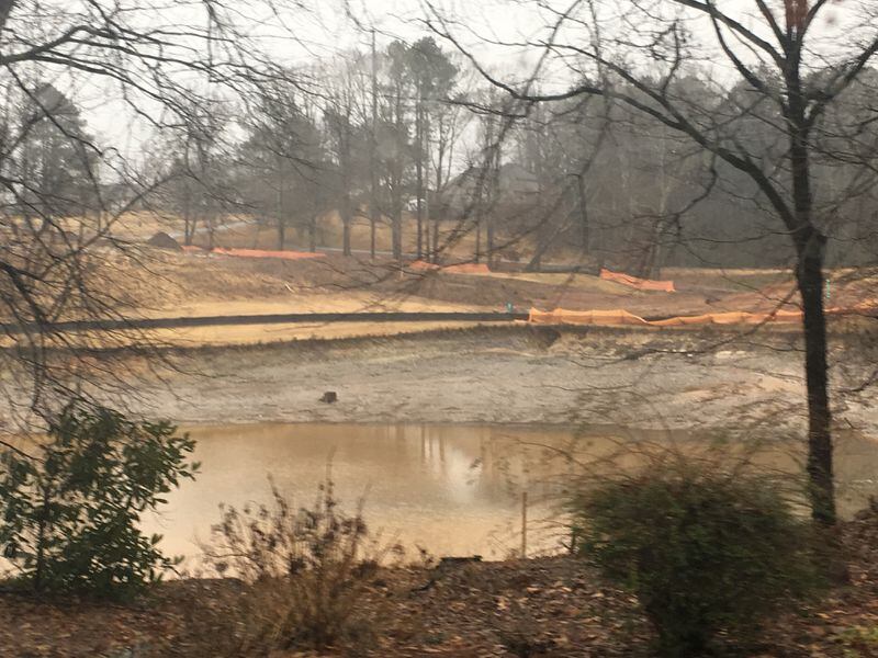 One of the former irrigation ponds on the former site of Lanier Golf Course, on which developer Danny Bennett is hoping to build more than 300 homes. SPECIAL PHOTO / JULIE ALLEN